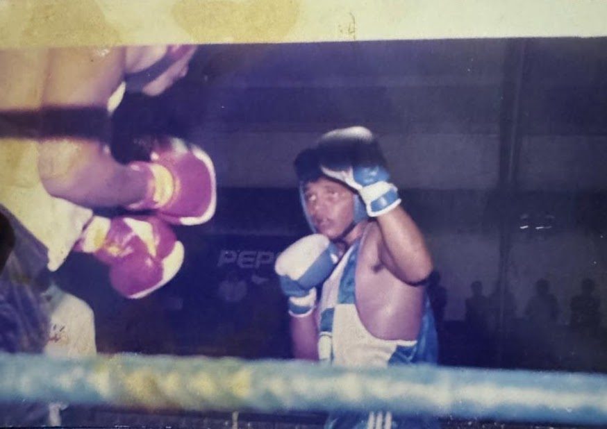 Nery boxing in the ring as a teenager in Guatemala