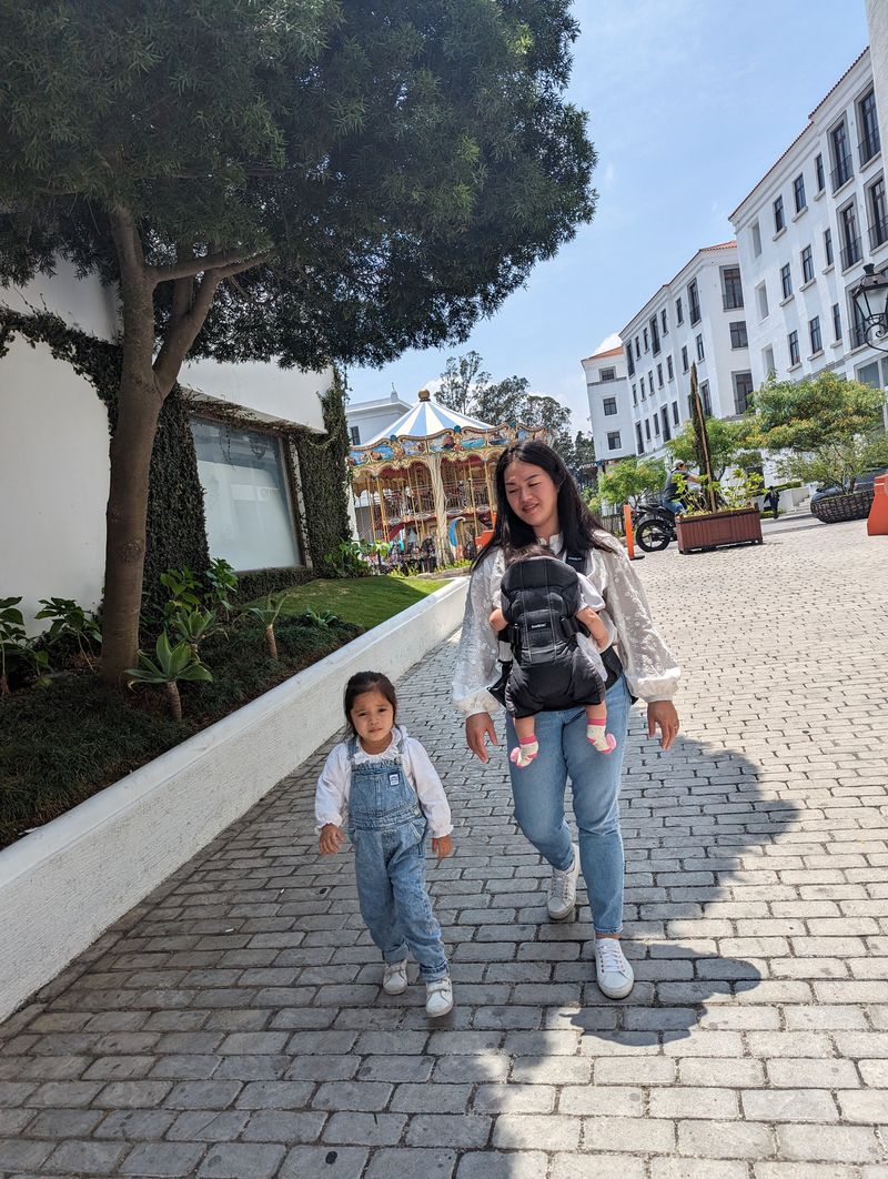 Joann walking with Milly and Luna in Guatemala City